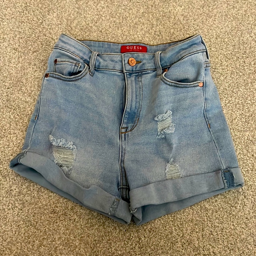 light wash ripped Guess jean shorts